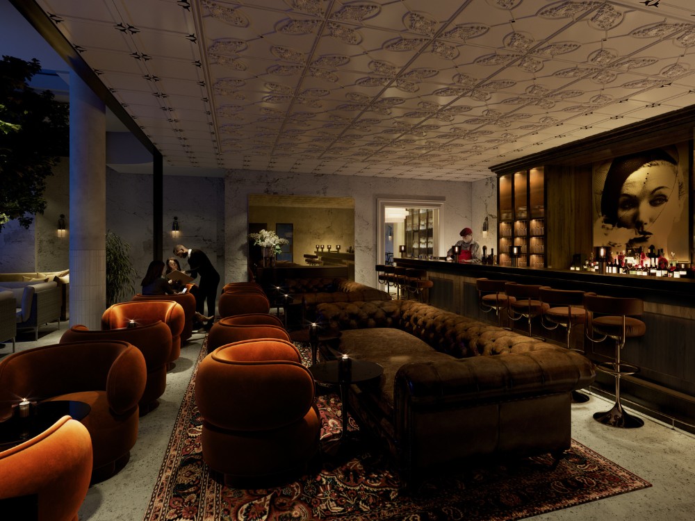 Lounge featuring plush orange armchairs, a leather sofa, ornate ceiling, and a well-lit bar, creating an inviting atmosphere.