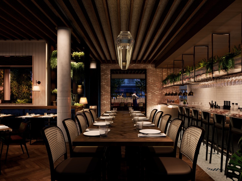 Restaurant interior with a long wooden table, elegant seating, warm lighting, and lush greenery, creating an inviting atmosphere.